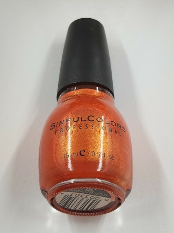 Nail polish swatch / manicure of shade Sinful Colors Courtney Orange