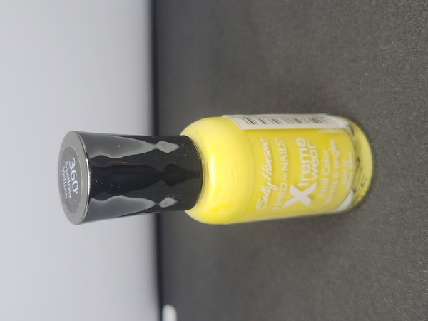 Nail polish swatch / manicure of shade Sally Hansen Mellow Yellow