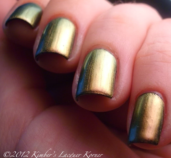 Nail polish swatch / manicure of shade Sally Hansen Firefly