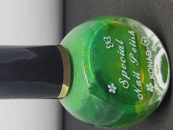 Nail polish swatch / manicure of shade Konad Green