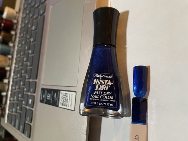 Nail polish swatch / manicure of shade Sally Hansen Co-Bolt Blue