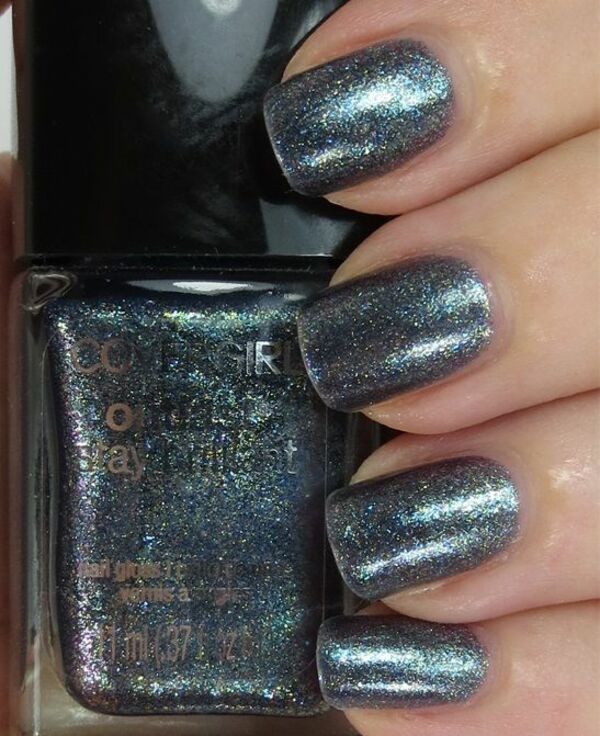 Nail polish swatch / manicure of shade CoverGirl Midnight Magic