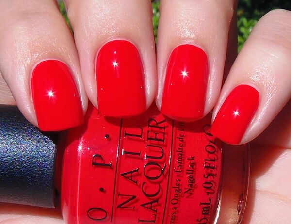 Nail polish swatch / manicure of shade OPI Coca-Cola Red