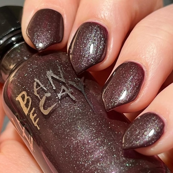 Nail polish swatch / manicure of shade Urban Decay Bruise