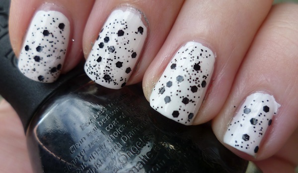 Nail polish swatch / manicure of shade Nubar Black Polka Dot