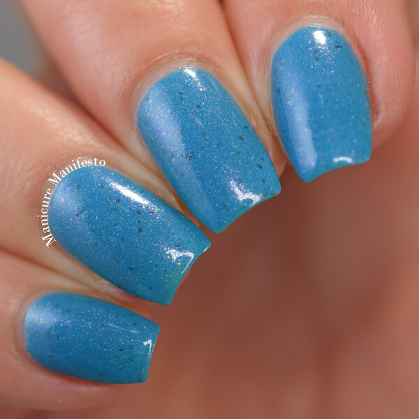 Nail polish swatch / manicure of shade Emerald and Ash Sunset at Sugar Beach