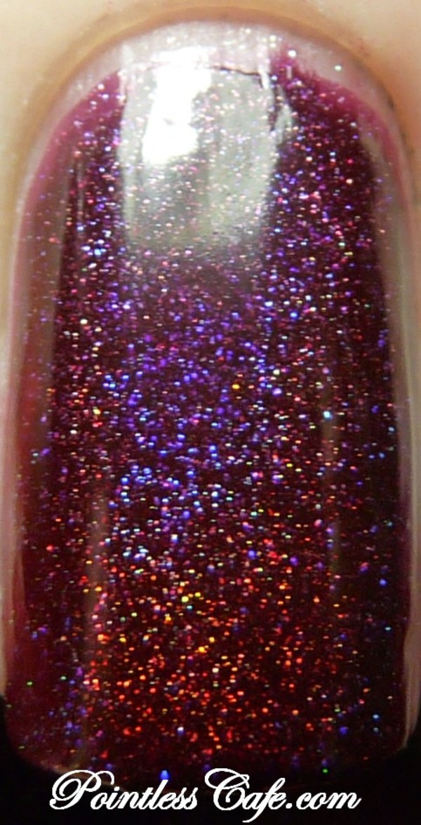 Nail polish swatch / manicure of shade Glitter Gal Transfusion