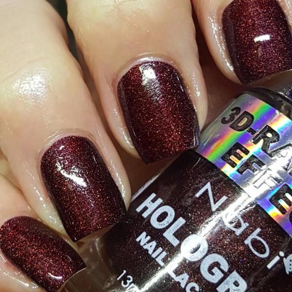 Nail polish swatch / manicure of shade Nabi Blackberry