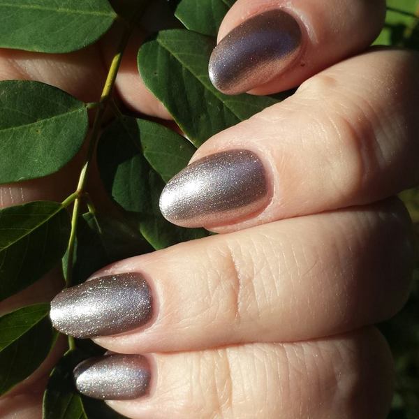 Nail polish swatch / manicure of shade Barielle Brown Sparkles