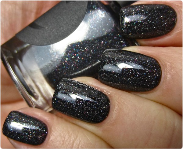 Nail polish swatch / manicure of shade Cirque Colors Dark Horse