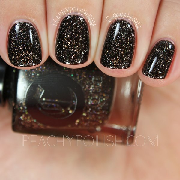 Nail polish swatch / manicure of shade Cirque Colors Smoky Quartz