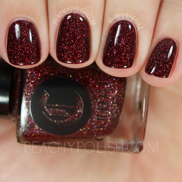 Nail polish swatch / manicure of shade Cirque Colors Garnet