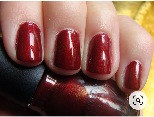 Nail polish swatch / manicure of shade Sinful Colors Burgandy Apple
