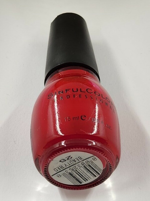 Nail polish swatch / manicure of shade Sinful Colors Beauty Red