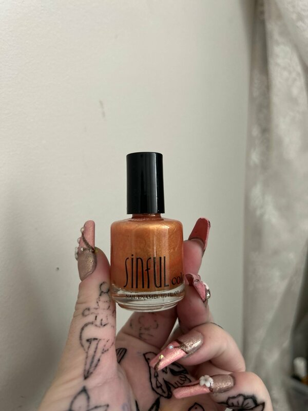 Nail polish swatch / manicure of shade Sinful Colors Tangerine