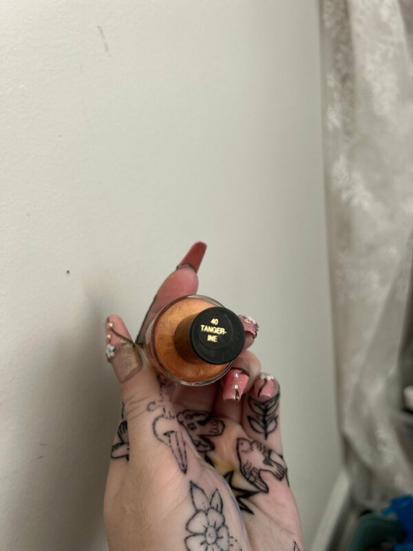 Nail polish swatch / manicure of shade Sinful Colors Tangerine