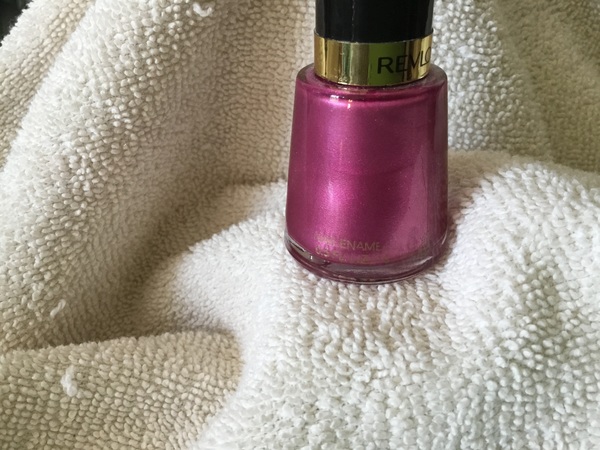 Nail polish swatch / manicure of shade Revlon Extravagant