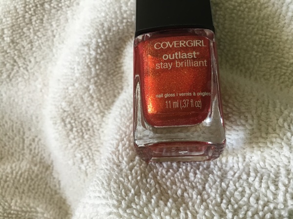 Nail polish swatch / manicure of shade CoverGirl Rogue Red