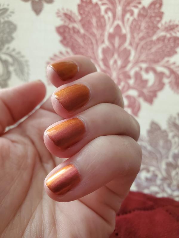 Nail polish swatch / manicure of shade Sally Hansen Pink Amber