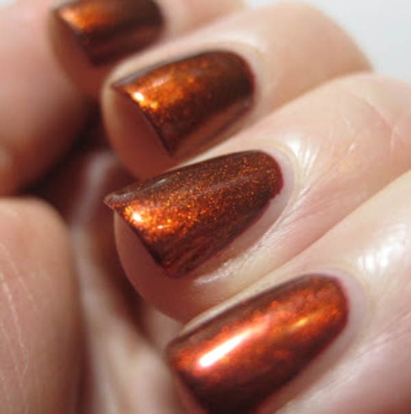 Nail polish swatch / manicure of shade Sally Hansen Bronze Ruby