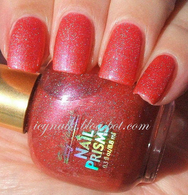 Nail polish swatch / manicure of shade Sally Hansen Mandarin Garnet