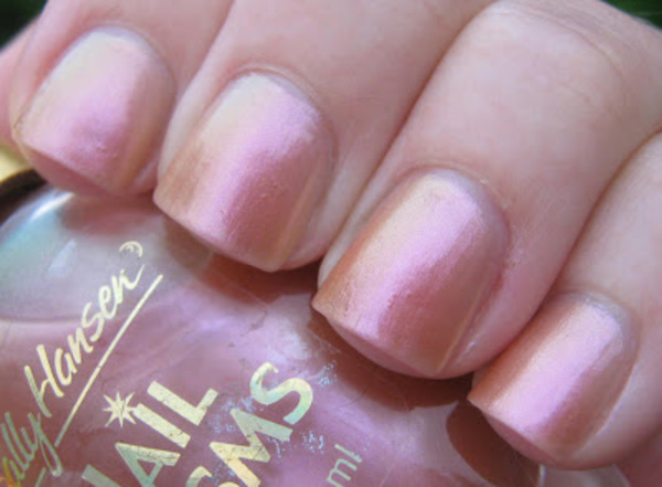 Nail polish swatch / manicure of shade Sally Hansen Cinnabar  Opal