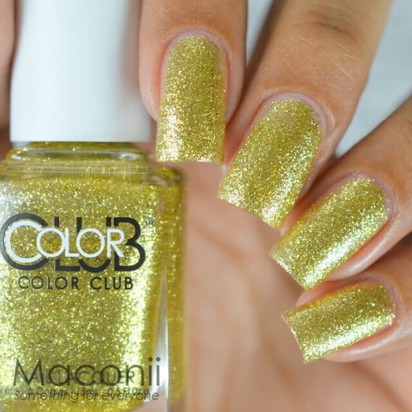 Nail polish swatch / manicure of shade Color Club Gold Glitter