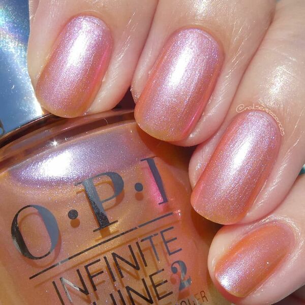 Nail polish swatch / manicure of shade OPI Coral Chroma