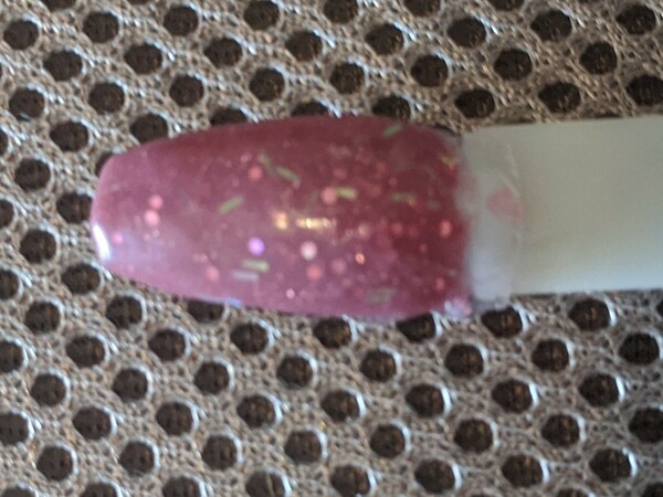 Nail polish swatch / manicure of shade Revel Loose Cannon