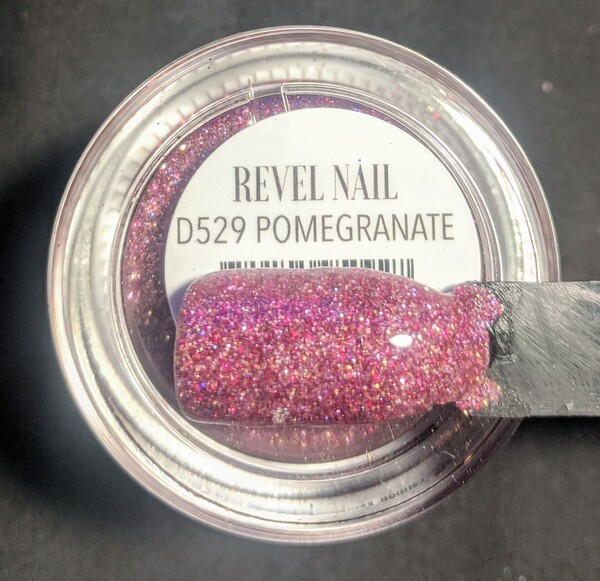 Nail polish swatch / manicure of shade Revel Pomegranate