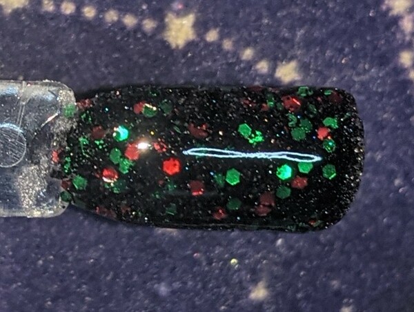 Nail polish swatch / manicure of shade Sparkle and Co. Santa's Coal Fierce