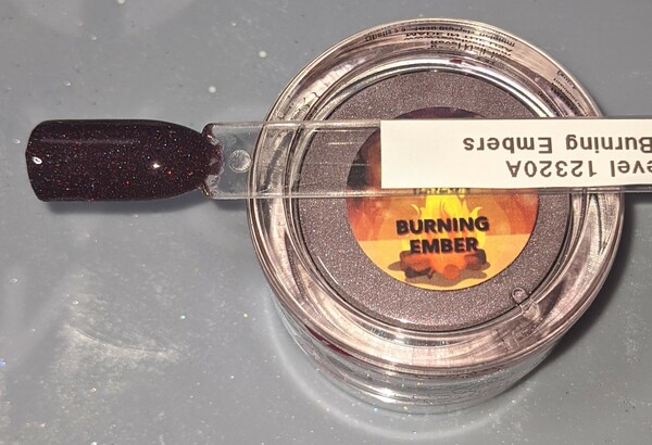Nail polish swatch / manicure of shade Revel Burning Ember