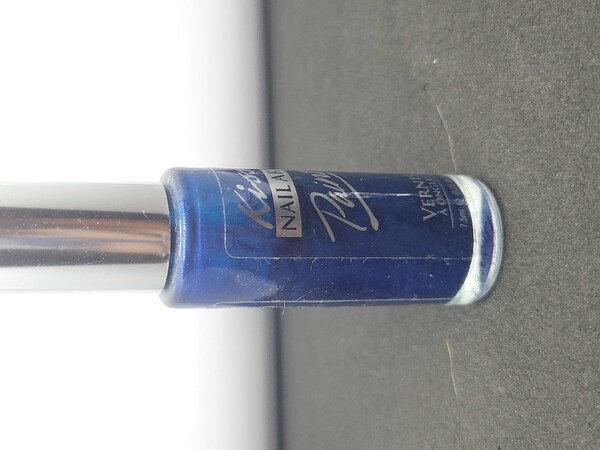 Nail polish swatch / manicure of shade Kiss Pearl Blue