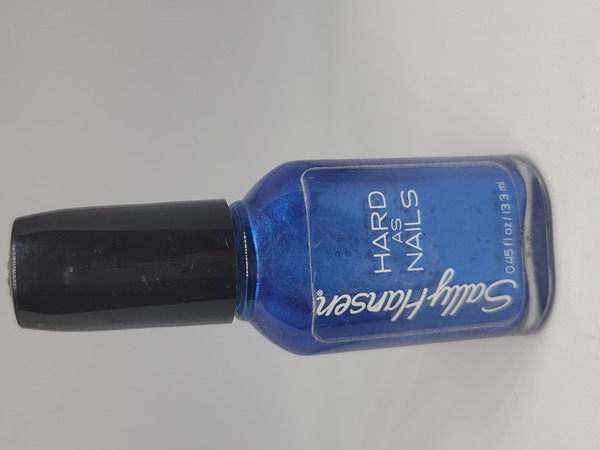 Nail polish swatch / manicure of shade Sally Hansen Sturdy Sapphire