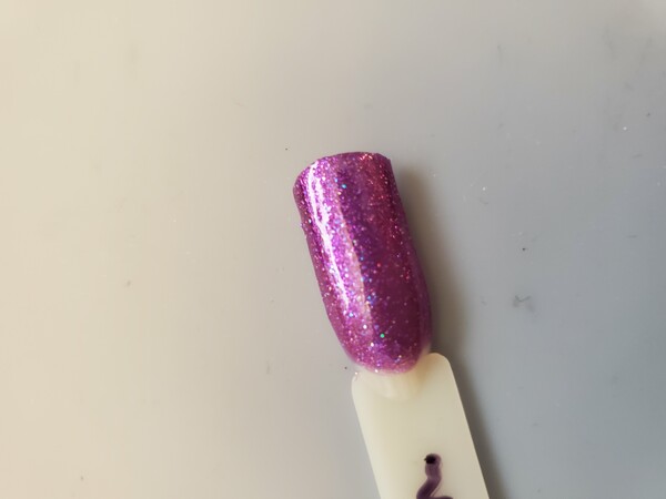 Nail polish swatch / manicure of shade Sally Hansen Purple Prism
