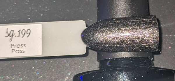 Nail polish swatch / manicure of shade Sparkle and Co. Press Pass