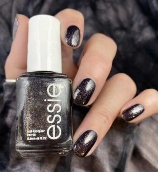 Nail polish swatch / manicure of shade essie Payback's a witch
