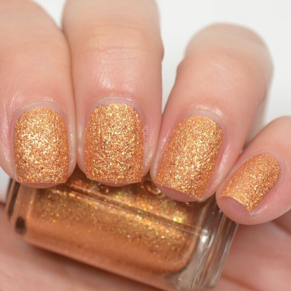 Nail polish swatch / manicure of shade essie Can't stop her in copper