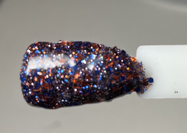 Nail polish swatch / manicure of shade Sparkle and Co. Orange and Blue
