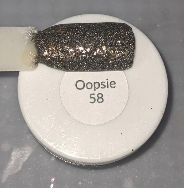 Nail polish swatch / manicure of shade Sparkle and Co. Oopsie 58
