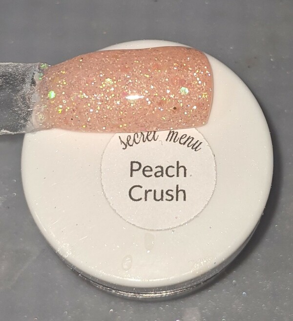 Nail polish swatch / manicure of shade Sparkle and Co. Peach Crush
