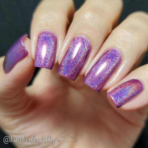 Nail polish swatch / manicure of shade Dam Nail Polish Positively Purple