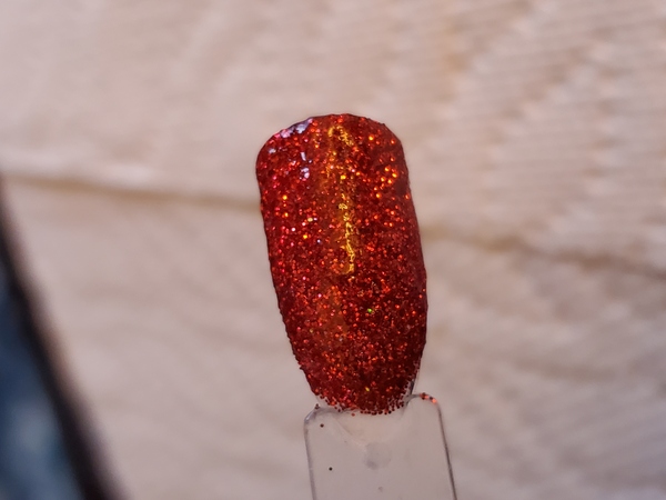 Nail polish swatch / manicure of shade Aikker Ribbon Red