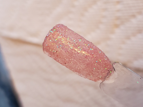 Nail polish swatch / manicure of shade Aikker Coral Pink