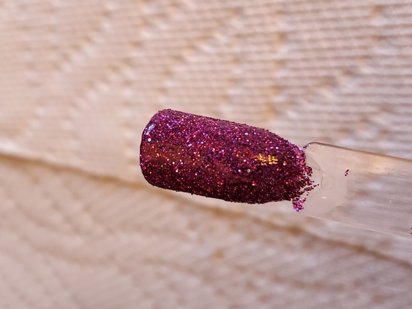 Nail polish swatch / manicure of shade Aikker Dewberry