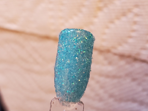 Nail polish swatch / manicure of shade Aikker Scuba Blue