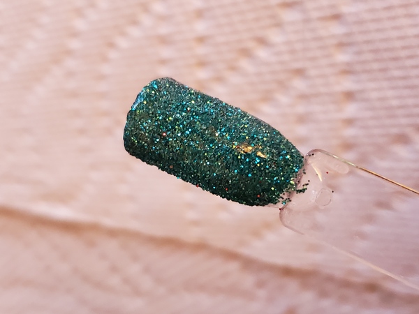 Nail polish swatch / manicure of shade Aikker Teal Green