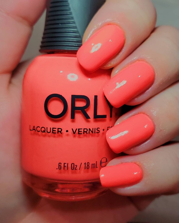 Nail polish swatch / manicure of shade Orly Artificial Orange