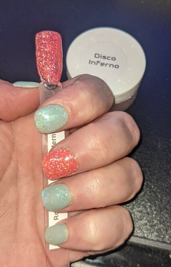 Nail polish swatch / manicure of shade Rocky Mountain Dip Powder Disco Inferno