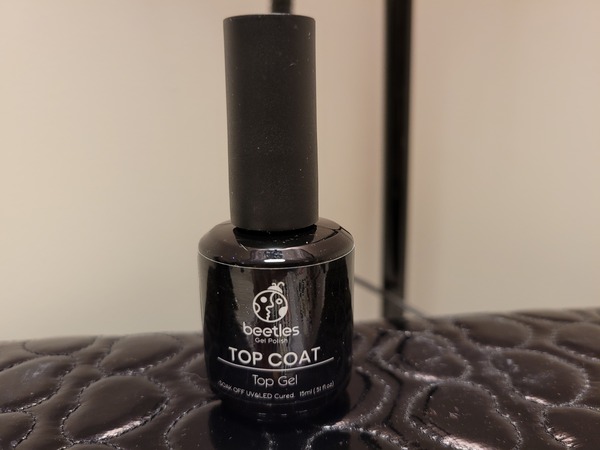 Nail polish swatch / manicure of shade Beetles Top Coat